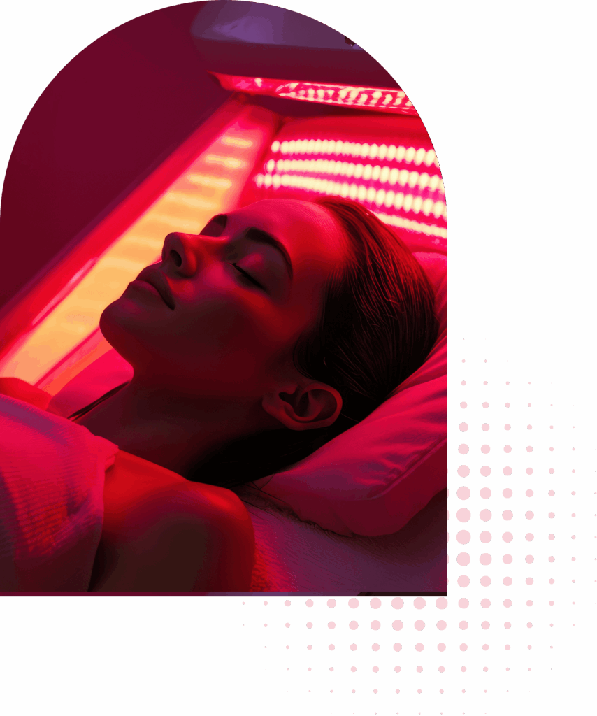Woman resting peacefully during red light therapy facial session for relaxation and skin rejuvenation at ReNuYou wellness studio